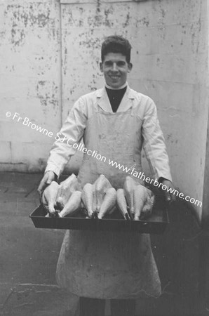 TURKEYS MAN SHOWING SPECIMENS READY FOR THE OVEN